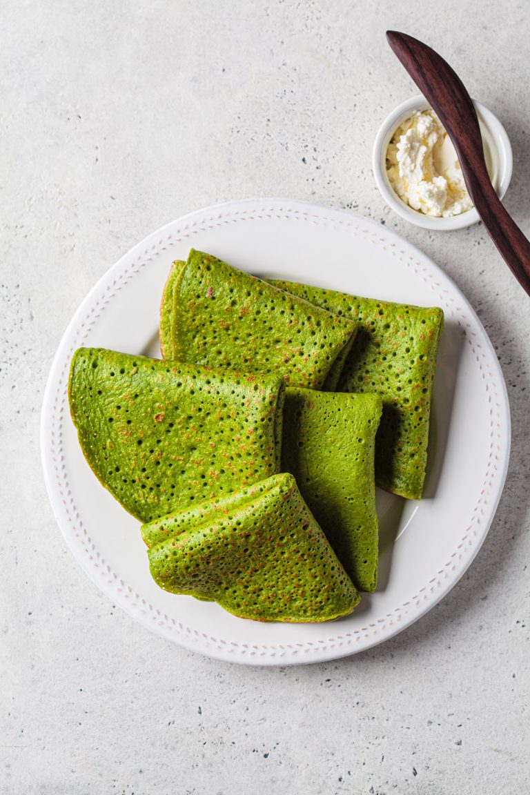Spinach,Crepes,On,White,Plate,,Top,View