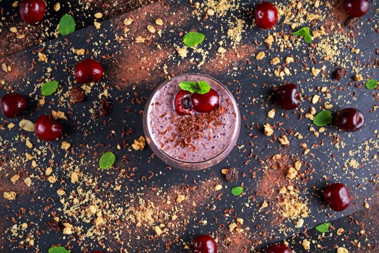 Healthy,Breakfast,Chocolate,,Berry,And,Oats,Smoothie,Decorated,With,Cherry