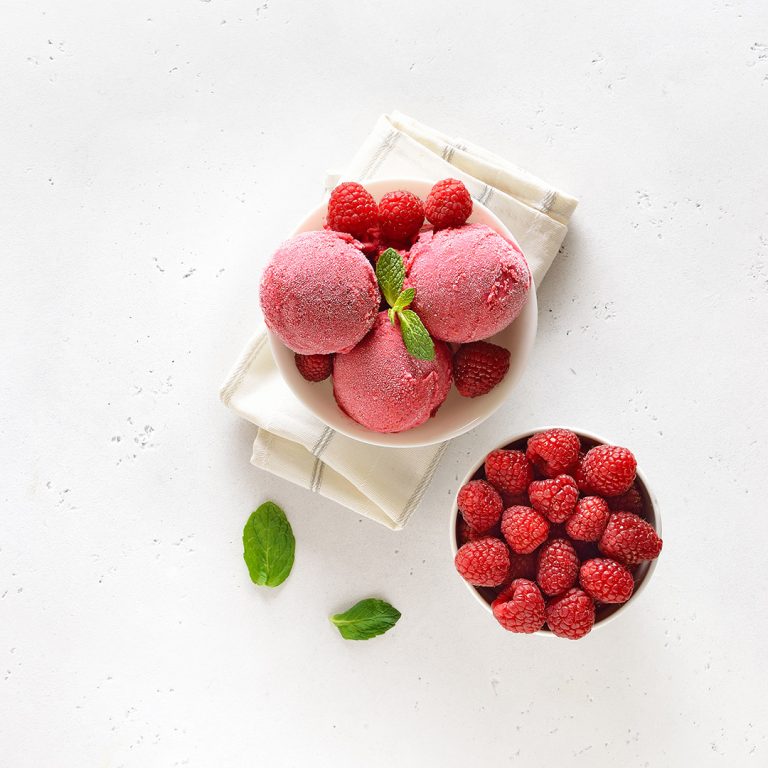 Homemade,Raspberry,Ice,Cream,Scoop,In,Bowl,And,Fresh,Berries