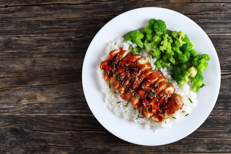 White,Rice,Topped,With,Teriyaki,Chicken,Breast,Sprinkled,With,Chives,