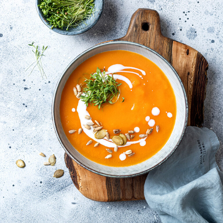 Vegetarian,Autumn,Pumpkin,And,Carrot,Soup,With,Cream,,Seeds,And