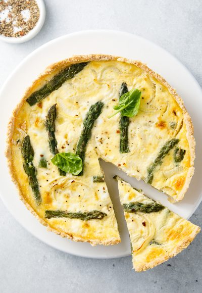 Homemade asparagus quiche with spinach