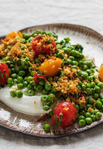 Burrata cheese with grilled green peas, pickled tomatoes and breadcrumbs