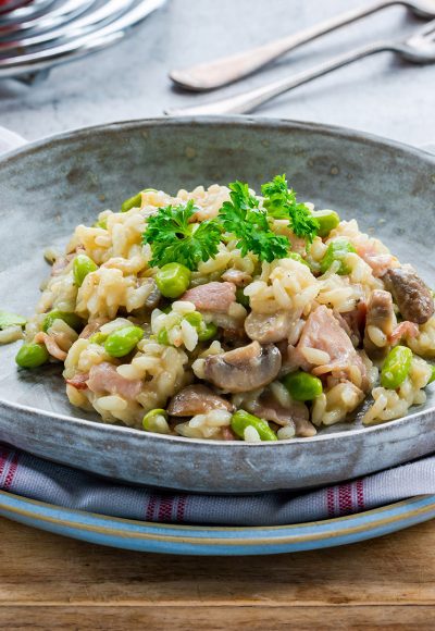 Bacon and mushroom risotto with edamame beans