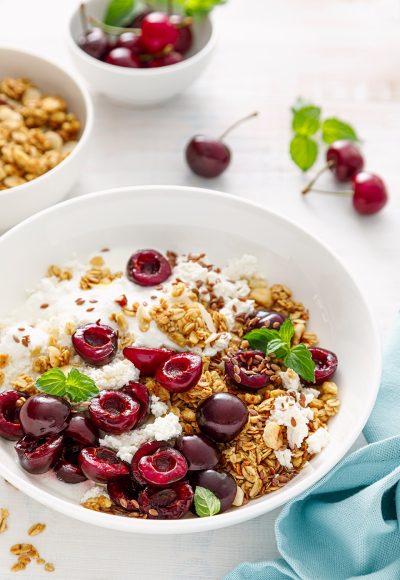 Sour cherry granola with cottage cheese and yogurt. Healthy food, diet breakfast